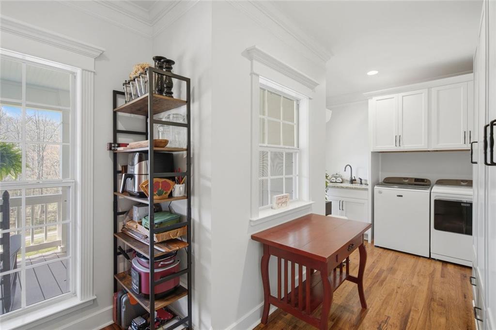 1852 Oak Grove Road Dahlonega, GA 30533 - Photo 51 of 68 a kitchen with stainless steel appliances a stove a window and a refrigerator