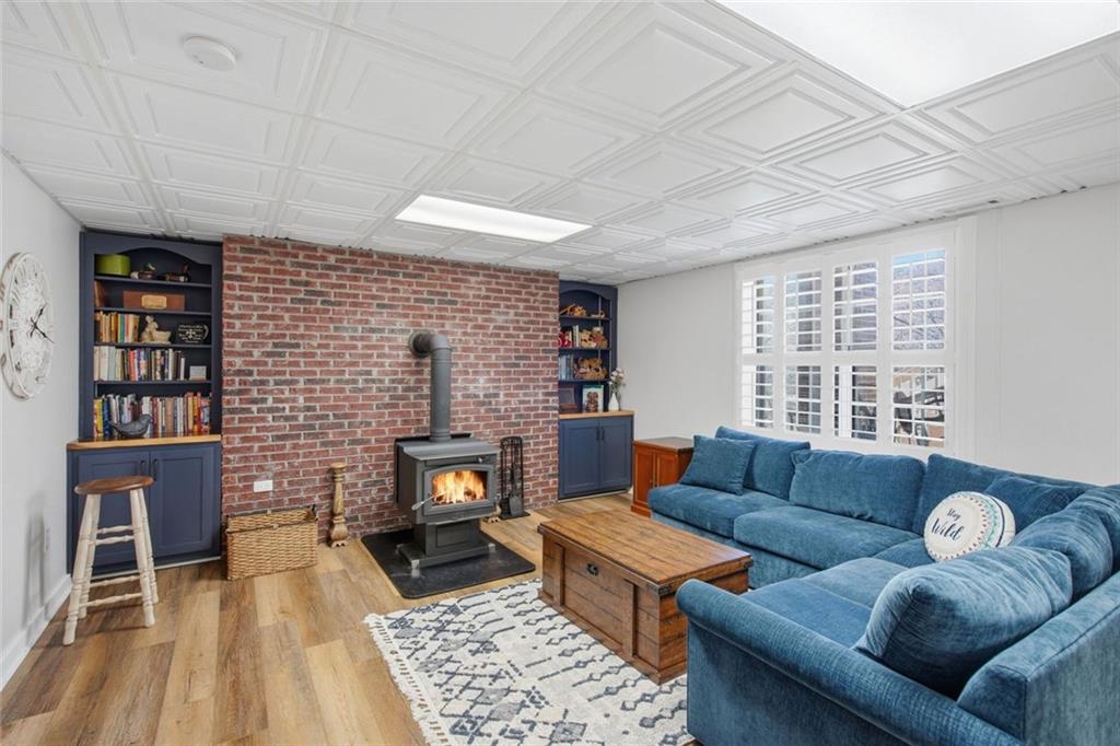1852 Oak Grove Road Dahlonega, GA 30533 - Photo 61 of 68 a living room with furniture and a fireplace