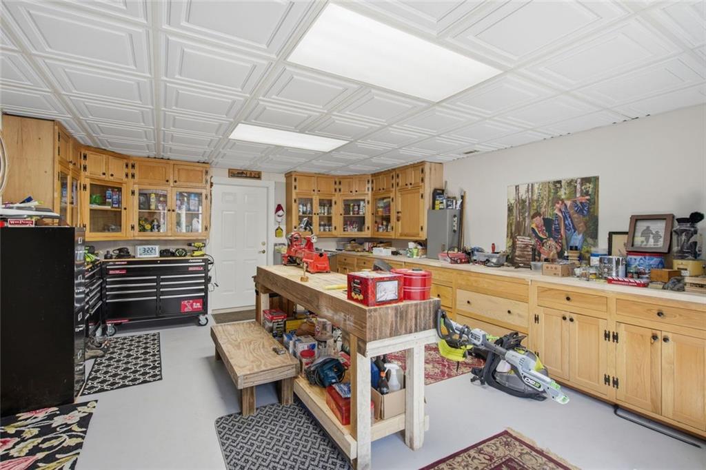 1852 Oak Grove Road Dahlonega, GA 30533 - Photo 67 of 68 a bedroom with furniture and a window