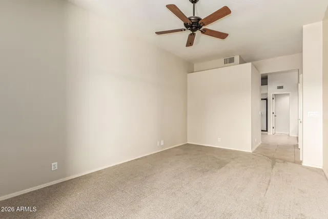 a view of a lake with a houses in the background