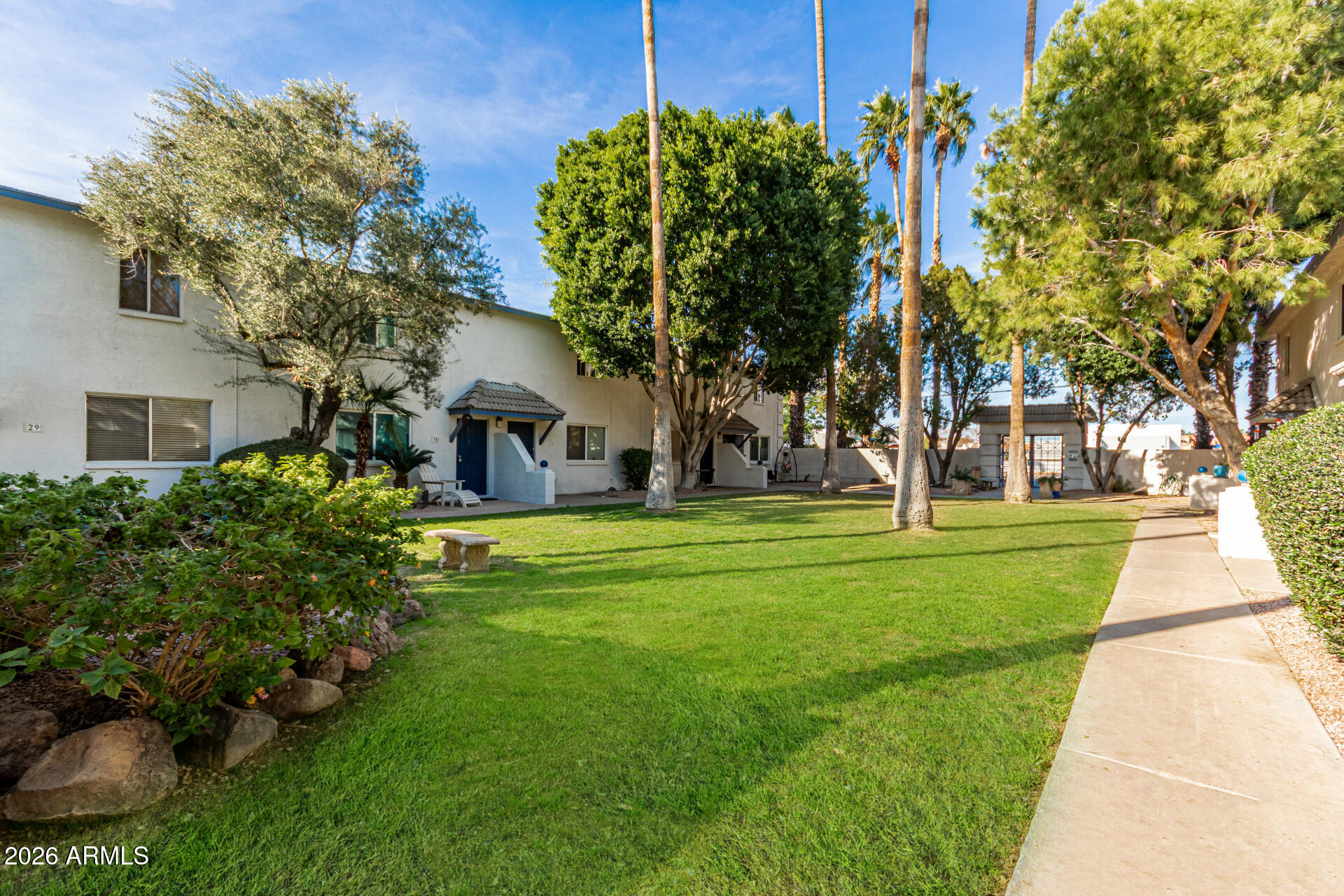 1531 West Colter Street, Unit 1 Phoenix, AZ 85015 - Photo 23 of 32 a front view of a house with garden