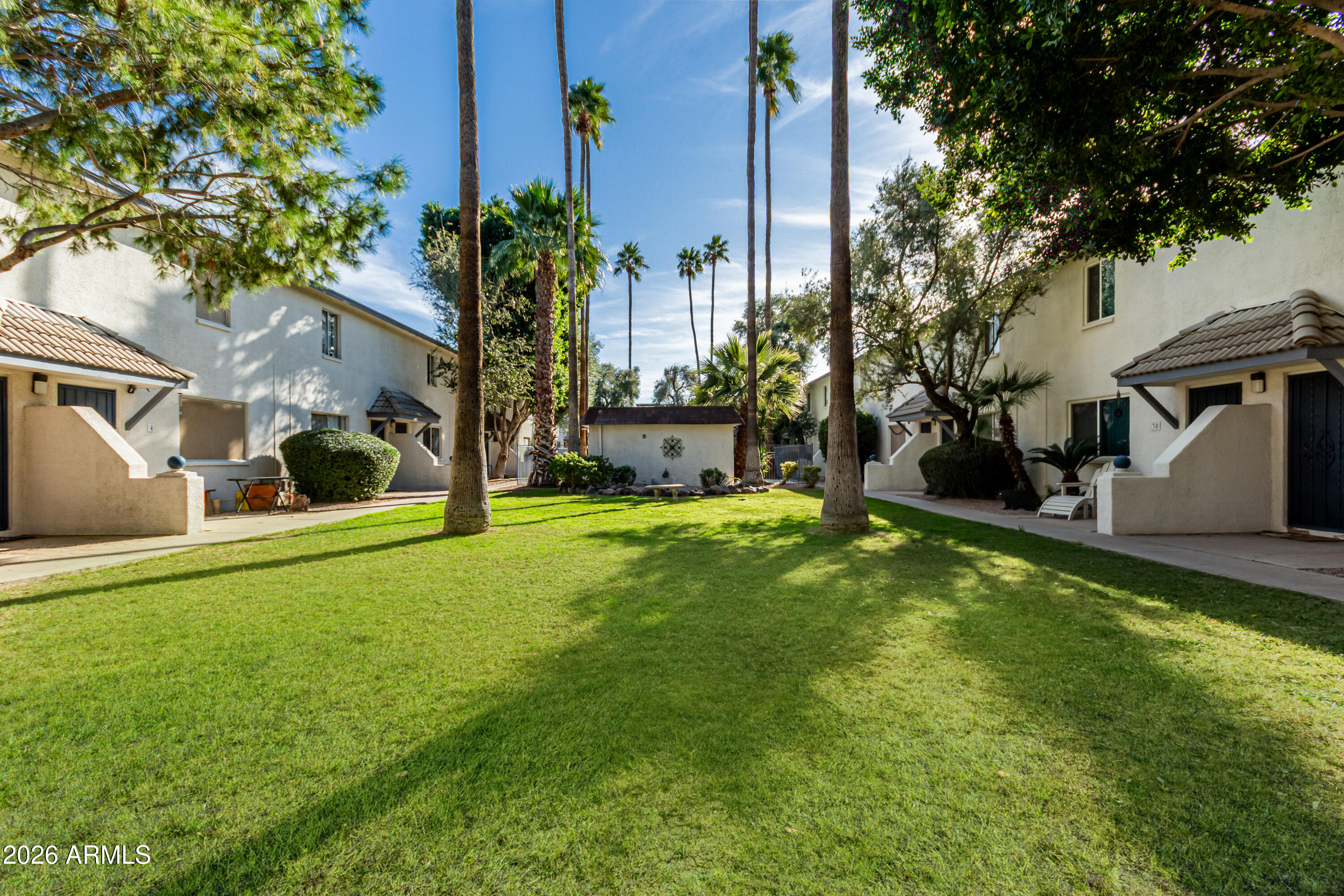 1531 West Colter Street, Unit 1 Phoenix, AZ 85015 - Photo 24 of 32 a view of a house with a backyard