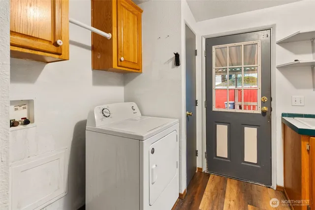 a utility room with dryer and washer