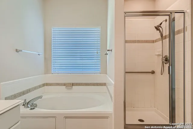 a bathroom with a sink and a bathtub