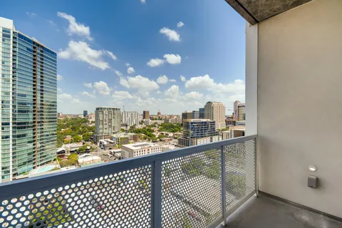 a view of a balcony with city view