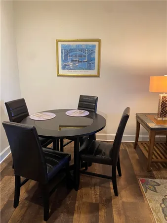 a view of a dining room with furniture