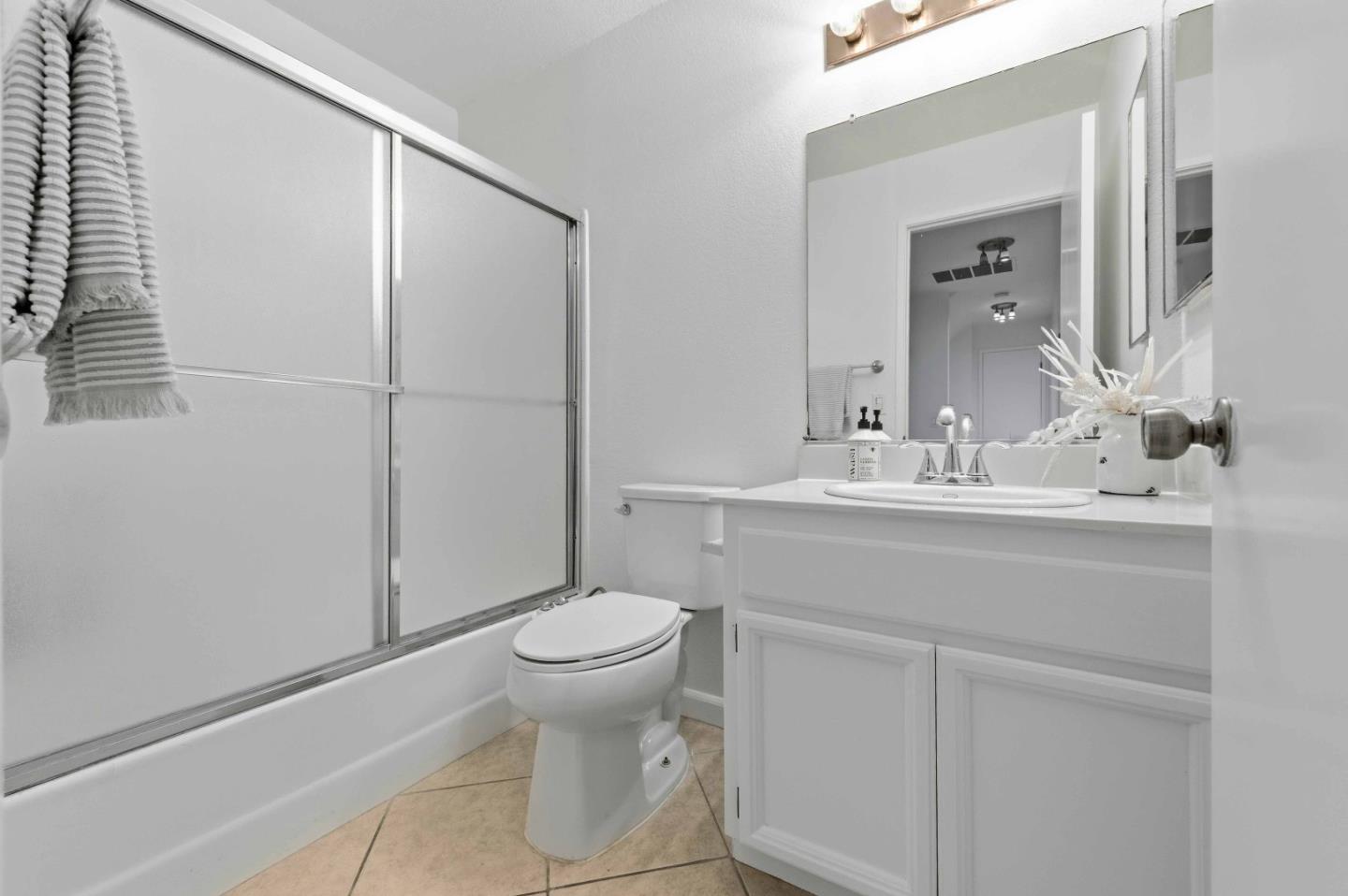 3115 Heather Ridge Drive San Jose, CA 95136 - Photo 19 of 22 a bathroom with a sink toilet and shower