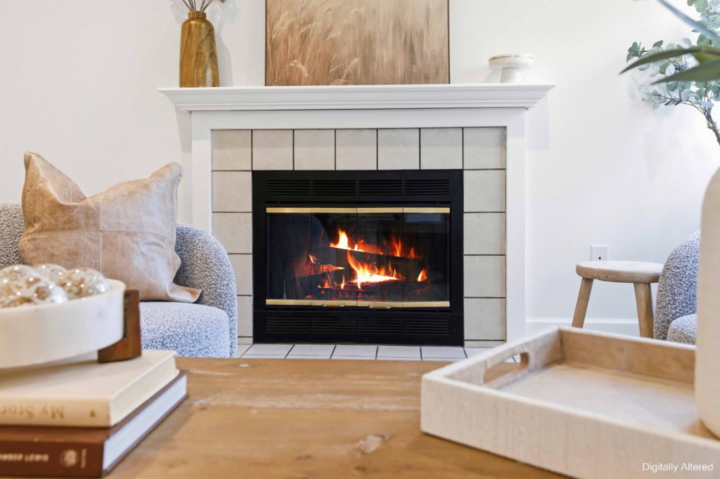 3115 Heather Ridge Drive San Jose, CA 95136 - Photo 5 of 22 a living room with furniture and a fireplace