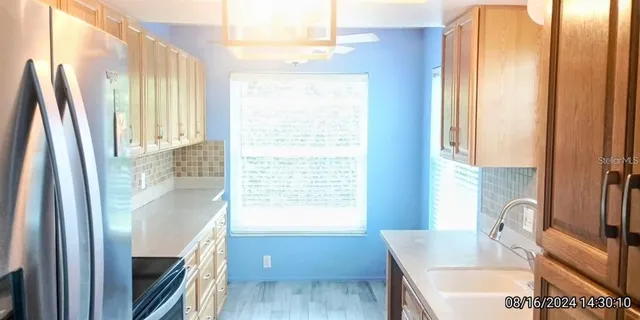 a bathroom with a bathtub and a sink