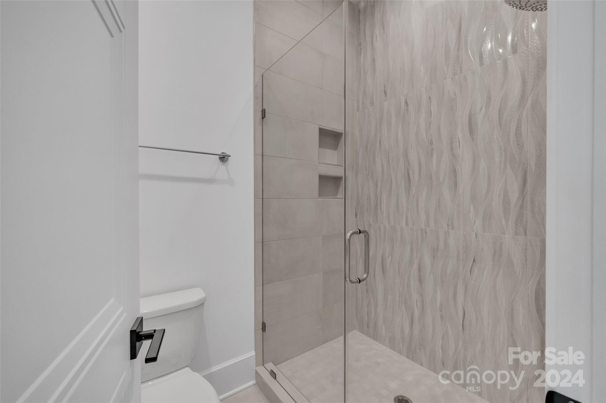 3500 Barclay Downs Drive Charlotte, NC 28209 - Photo 37 of 48 a bathroom with a shower