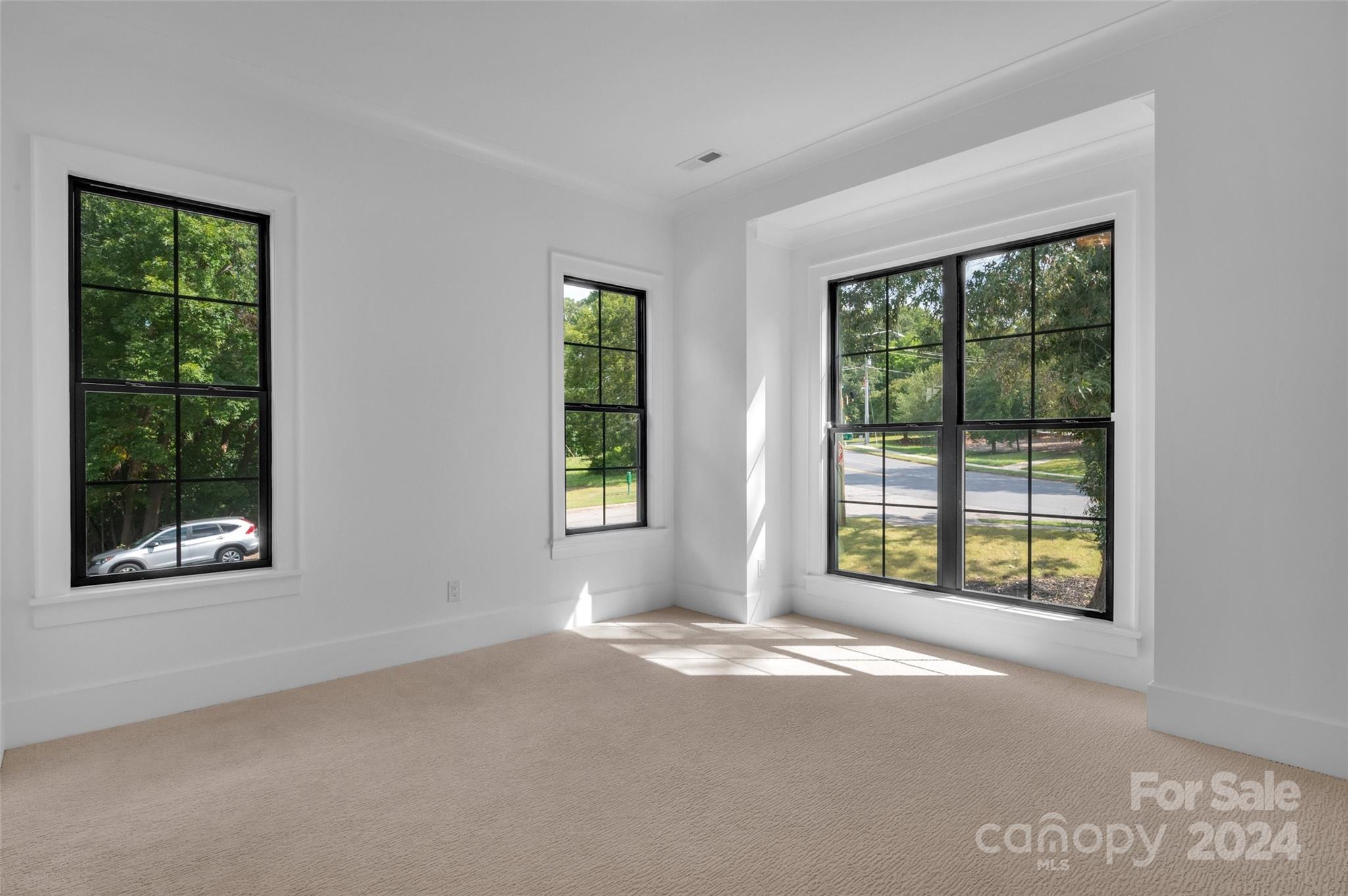 3500 Barclay Downs Drive Charlotte, NC 28209 - Photo 38 of 48 a view of an empty room with a window