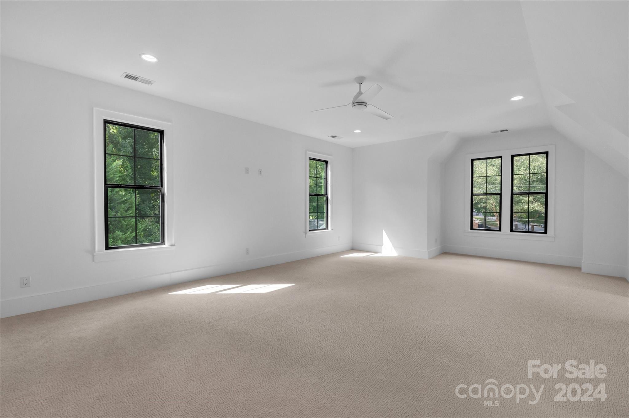 3500 Barclay Downs Drive Charlotte, NC 28209 - Photo 43 of 48 an empty room with windows and windows
