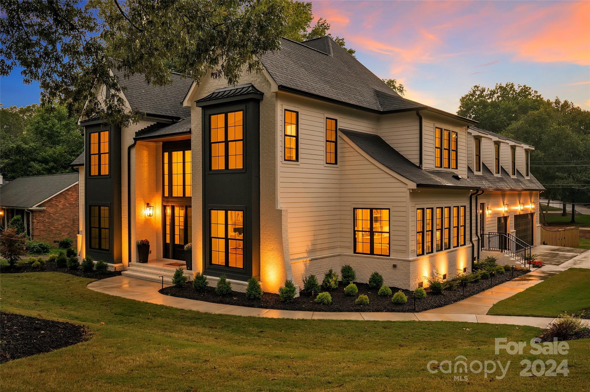 3500 Barclay Downs Drive Charlotte, NC 28209 - Photo 5 of 48 a front view of house with yard and green space