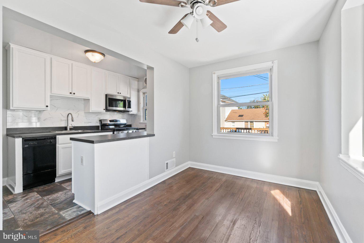 8426 Kavanagh Road Baltimore, MD 21222 - Photo 11 of 39 Updated kitchen cabinets, backsplash, appliances