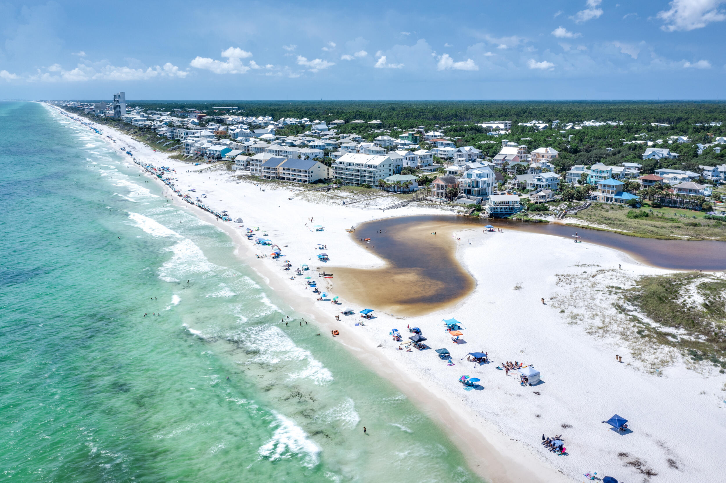 a view of a swimming pool with a yard