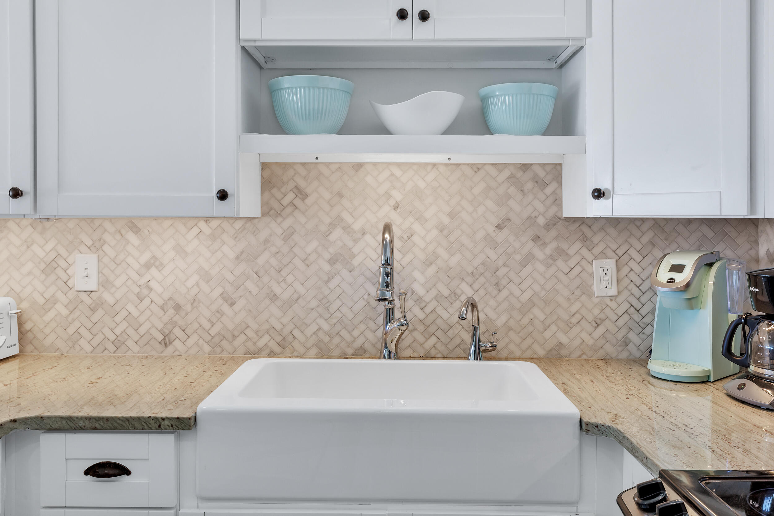 561 Eastern Lake Road, Unit 202 Santa Rosa Beach, FL 32459 - Photo 11 of 32 a bathroom with a granite countertop sink and white cabinets