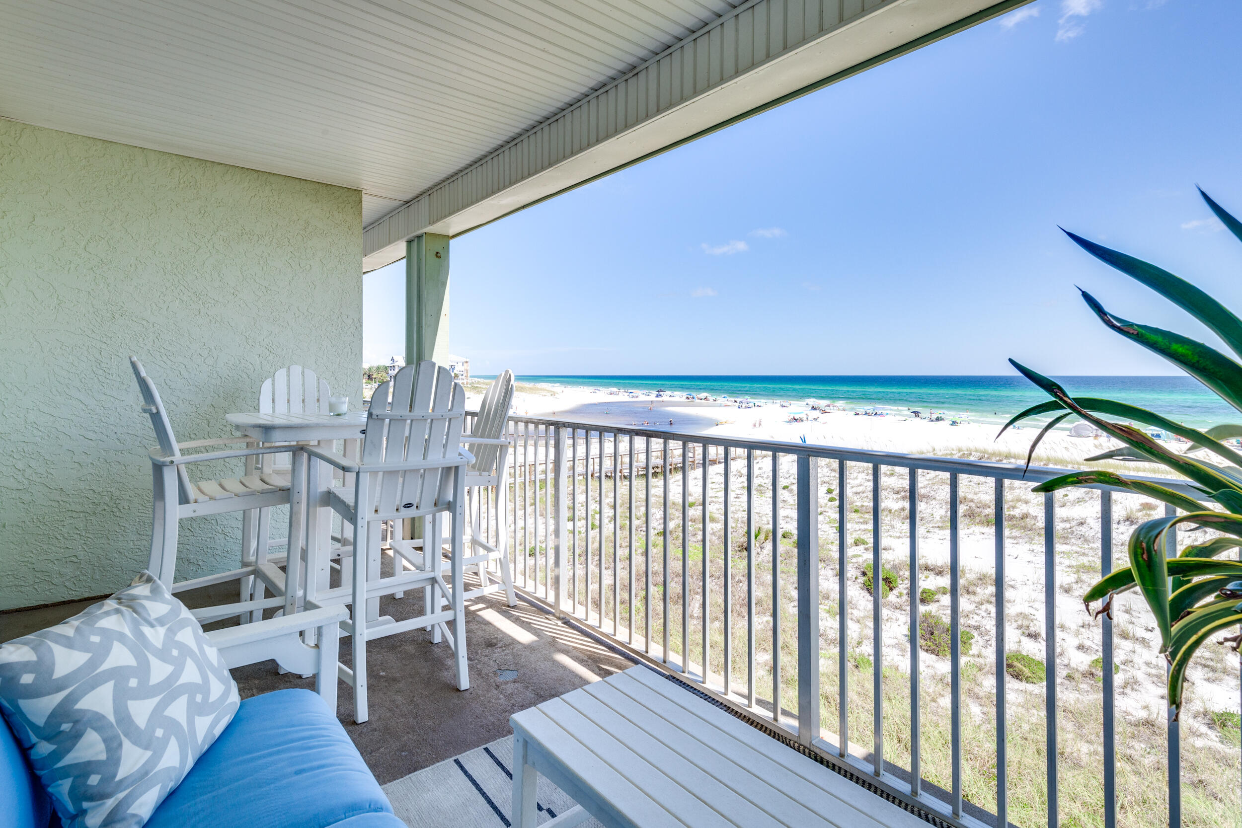 561 Eastern Lake Road, Unit 202 Santa Rosa Beach, FL 32459 - Photo 20 of 32 a view of a dining room with furniture window and wooden floor