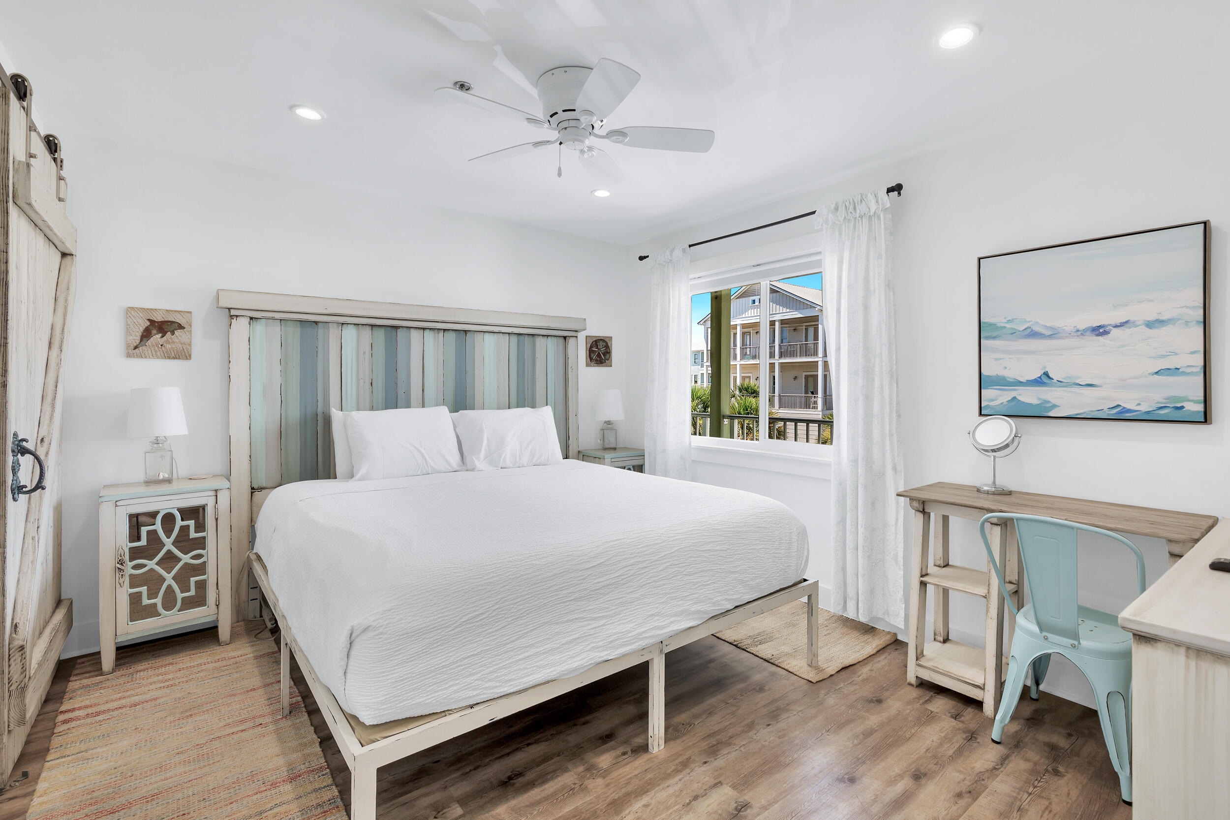 561 Eastern Lake Road, Unit 202 Santa Rosa Beach, FL 32459 - Photo 7 of 32 a large white bed in a white room