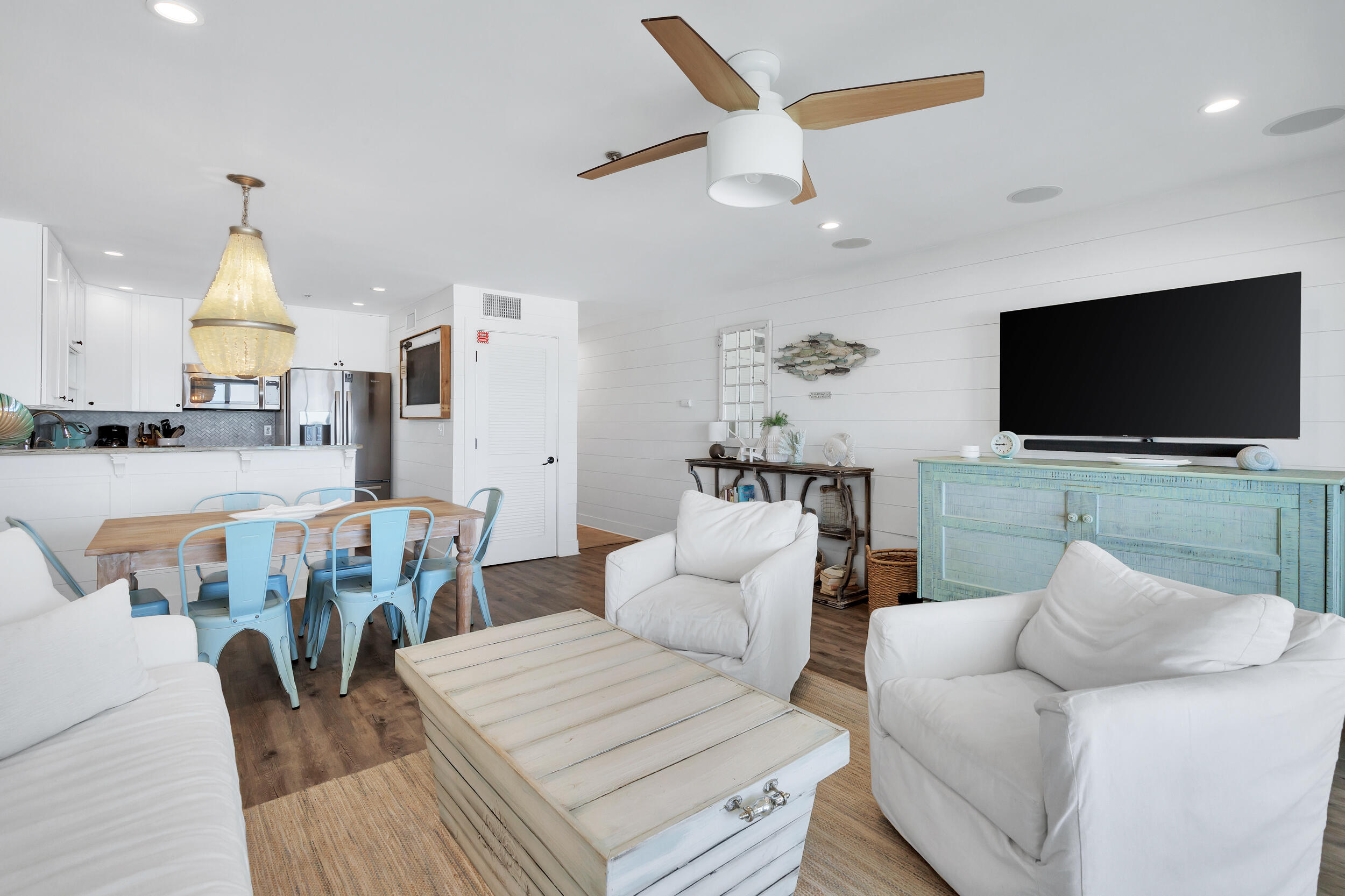 561 Eastern Lake Road, Unit 202 Santa Rosa Beach, FL 32459 - Photo 8 of 32 a living room with furniture and a flat screen tv