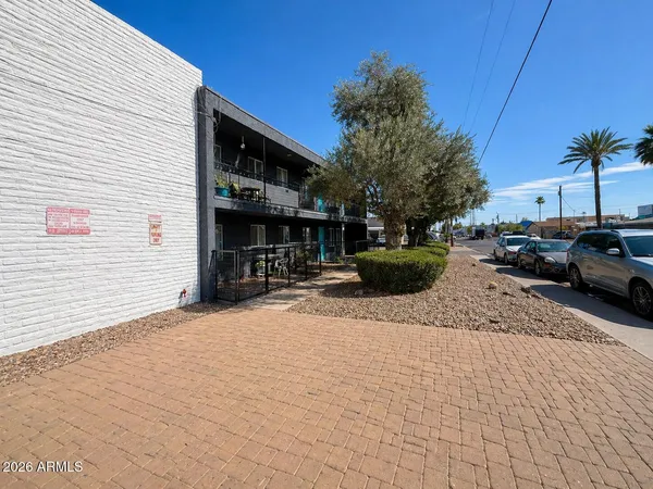 a view of the house with a patio