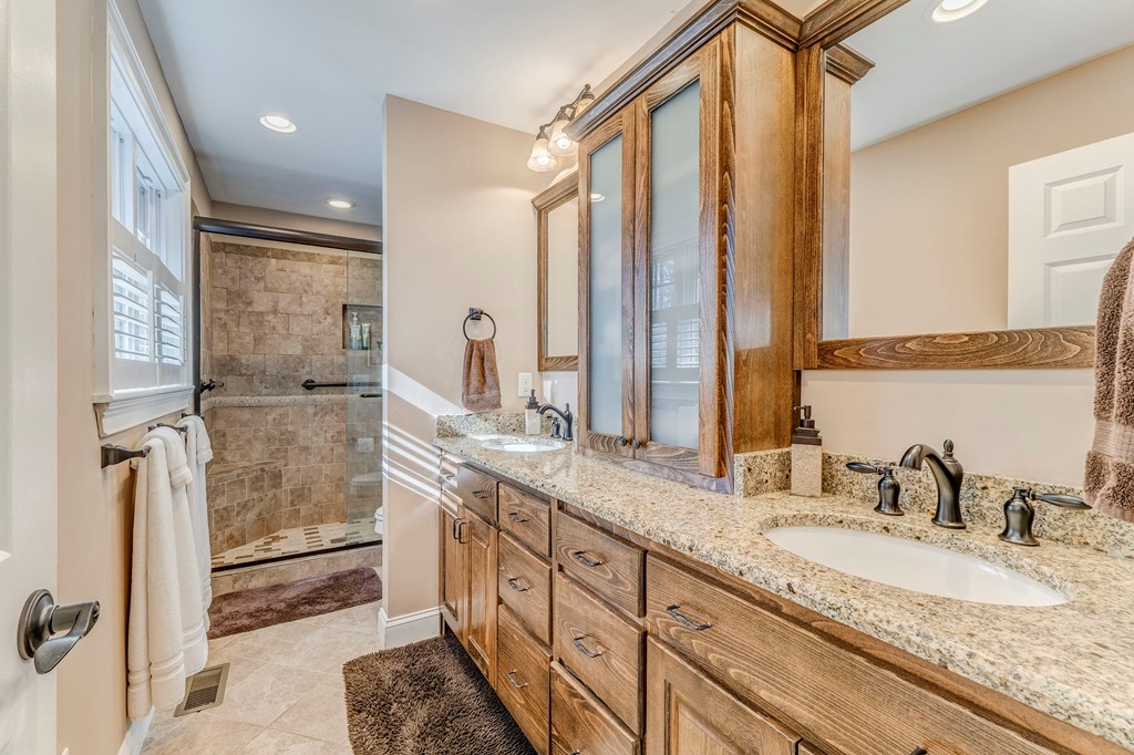 382 Adventure Trail Ellijay, GA 30536 - Photo 12 of 75 a bathroom with double vanity sinks and a shower