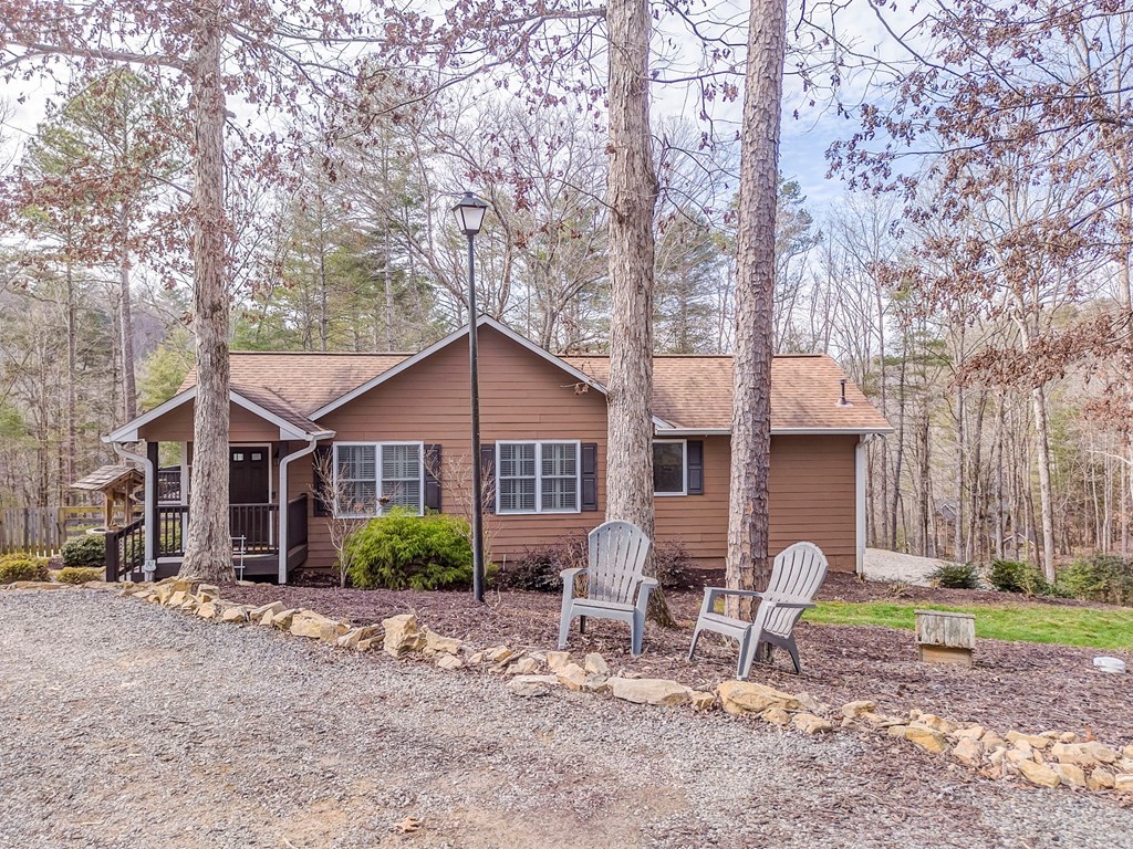 382 Adventure Trail Ellijay, GA 30536 - Photo 2 of 75 a view of a house with a yard and large trees