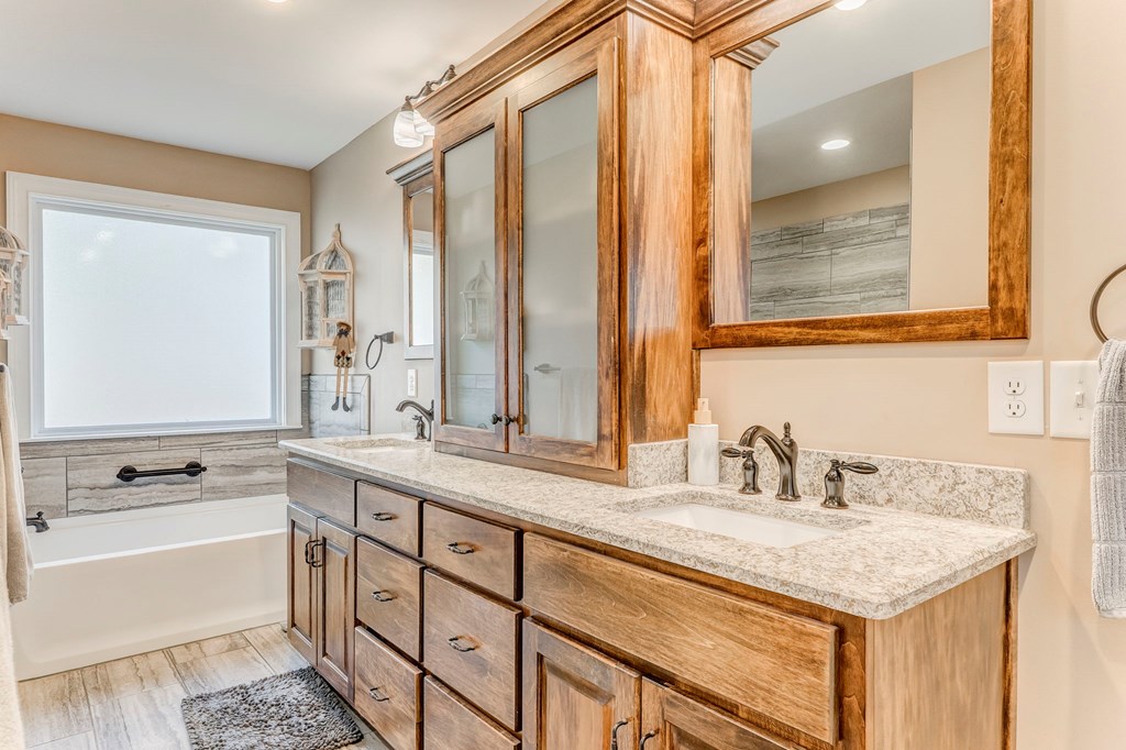 382 Adventure Trail Ellijay, GA 30536 - Photo 25 of 75 a bathroom with a sink and a mirror