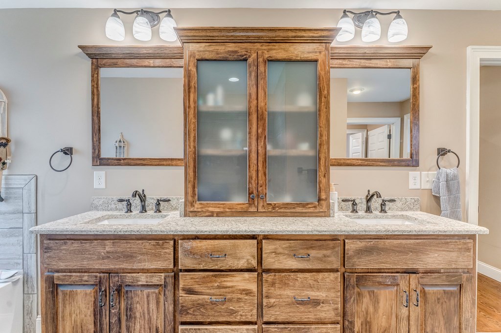 382 Adventure Trail Ellijay, GA 30536 - Photo 27 of 75 a bathroom with a sink and a mirror