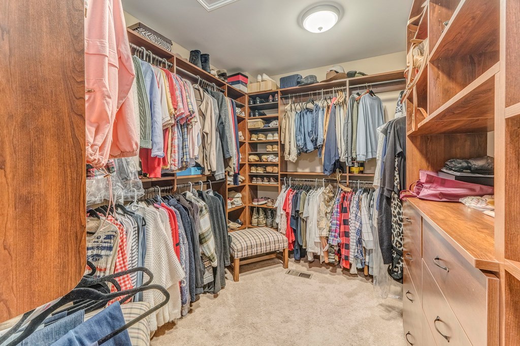 382 Adventure Trail Ellijay, GA 30536 - Photo 29 of 75 a view of walk in closet with clothes