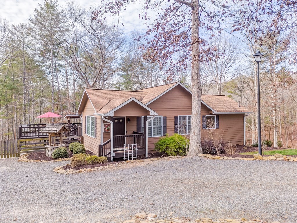 382 Adventure Trail Ellijay, GA 30536 - Photo 3 of 75 a view of a house with a yard and large trees