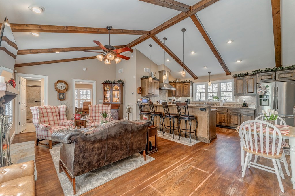 382 Adventure Trail Ellijay, GA 30536 - Photo 43 of 75 a living room with furniture a ceiling fan and a rug