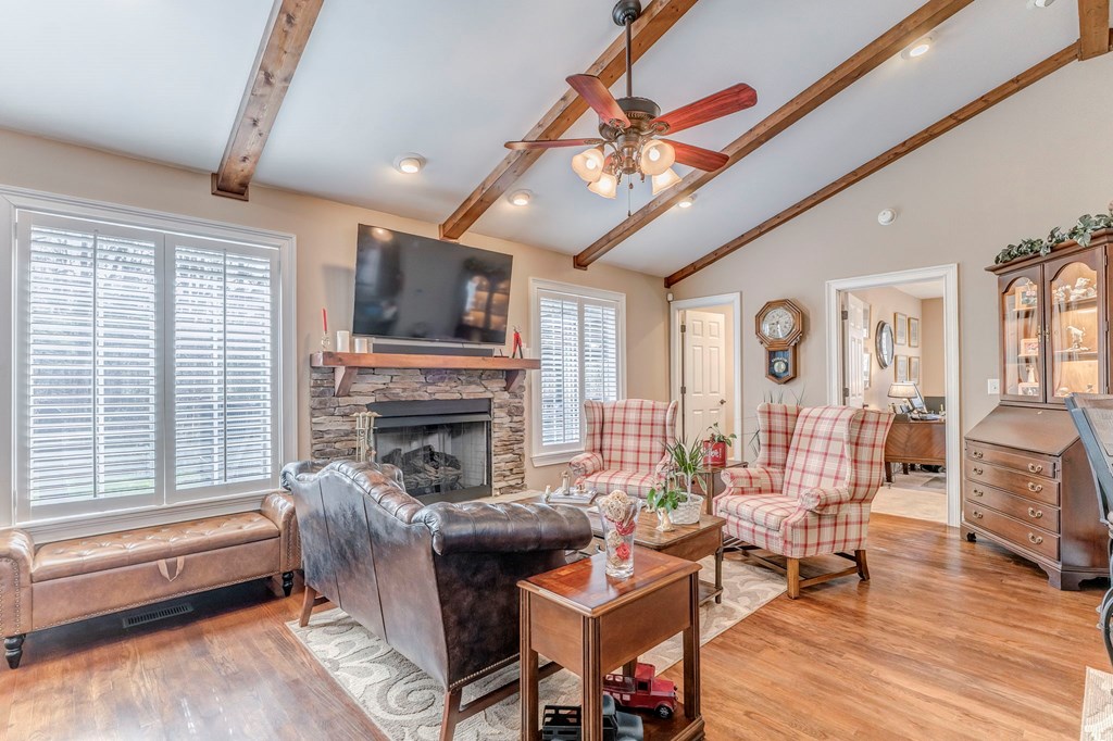 382 Adventure Trail Ellijay, GA 30536 - Photo 53 of 75 a living room with furniture a fireplace and a flat screen tv