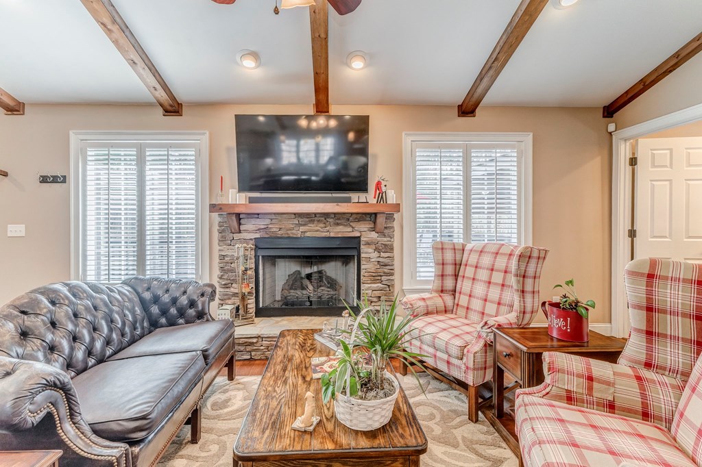 382 Adventure Trail Ellijay, GA 30536 - Photo 54 of 75 a living room with furniture fireplace and flat screen tv