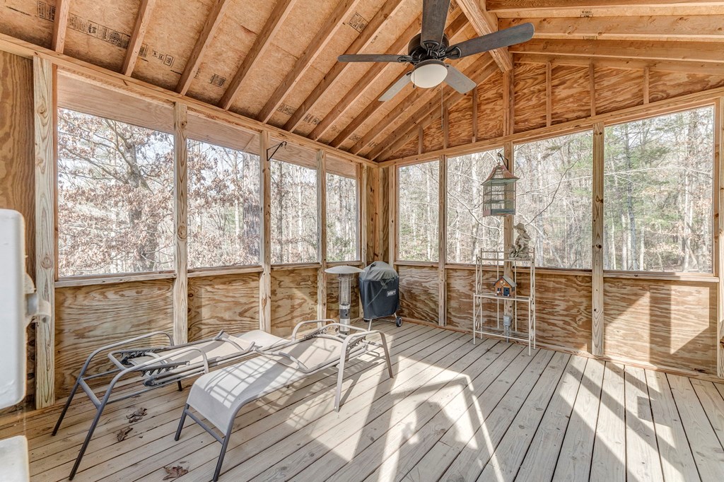 382 Adventure Trail Ellijay, GA 30536 - Photo 60 of 75 a bed sitting in a bedroom next to a large window