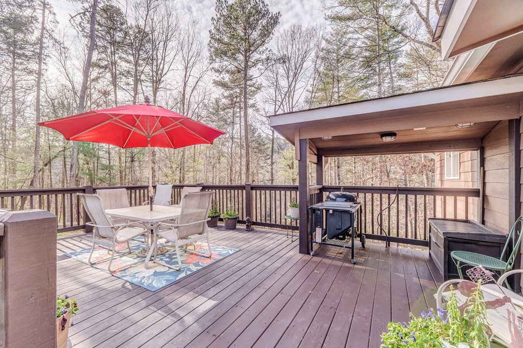 382 Adventure Trail Ellijay, GA 30536 - Photo 63 of 75 a view of balcony with outdoor seating and wooden floor