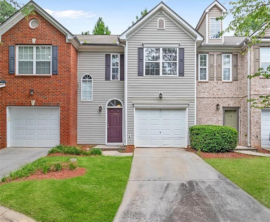 780 Nehemiah Lane Atlanta, GA 30331 - Photo 1 of 1 a front view of a house with a garden and plants