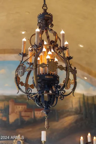 a spacious bedroom with two beds and a desk