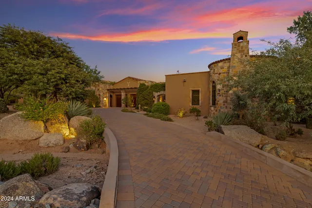 a view of a terrace with a bench and sky view