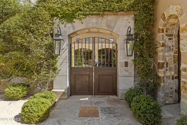 an aerial view of residential houses with outdoor space and street view