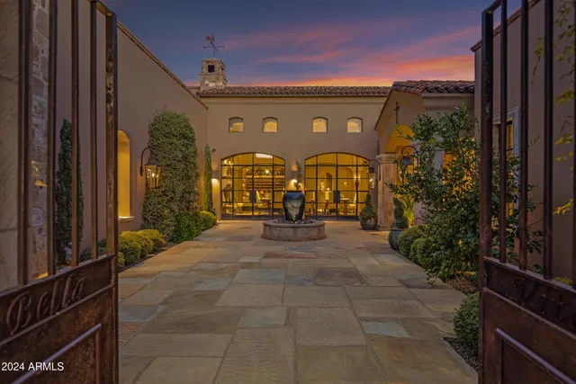 a view of a dining room and livingroom with furniture