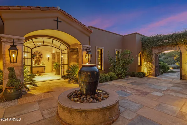 a view of a terrace with a bench and sky view