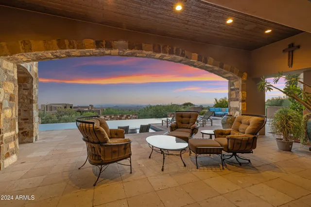 a view of a swimming pool with an ocean view