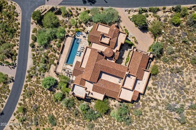 an aerial view of residential building and street