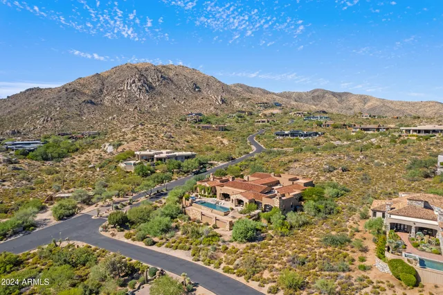 an aerial view of residential building and city view