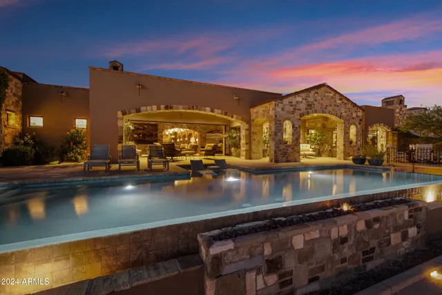 a view of a street with a building in the background