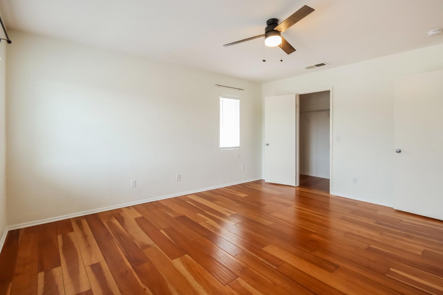 1103 Greenway Road Oceanside, CA 92057 - Photo 16 of 24 wooden floor in an empty room with a window