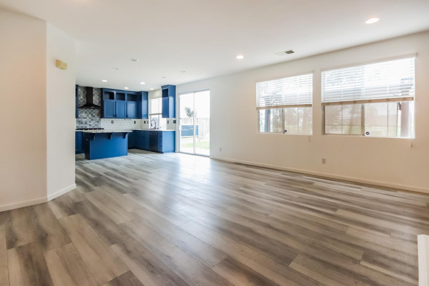 1103 Greenway Road Oceanside, CA 92057 - Photo 4 of 24 a view of kitchen and kitchen with wooden floor