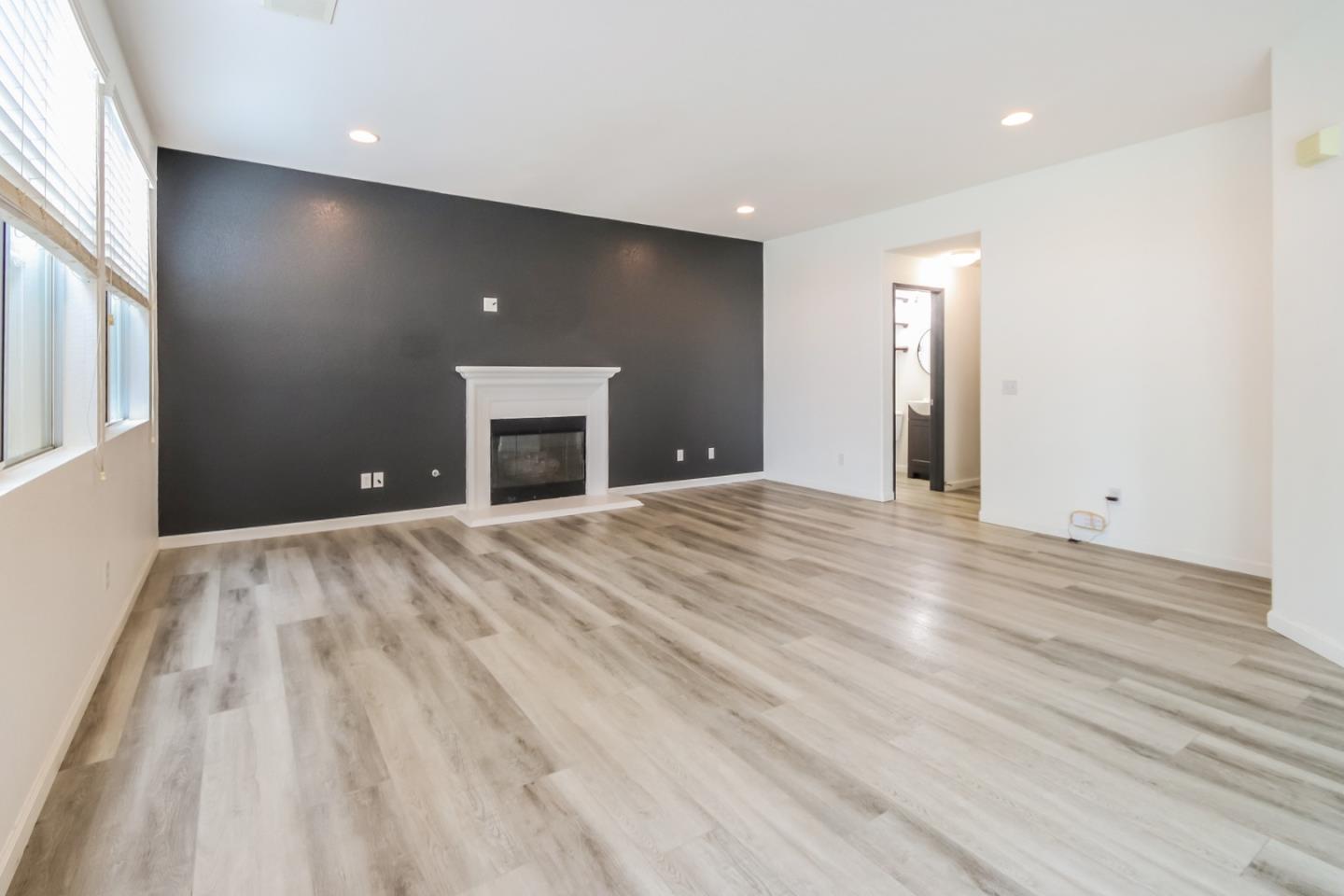 1103 Greenway Road Oceanside, CA 92057 - Photo 6 of 24 a view of a livingroom with a fireplace