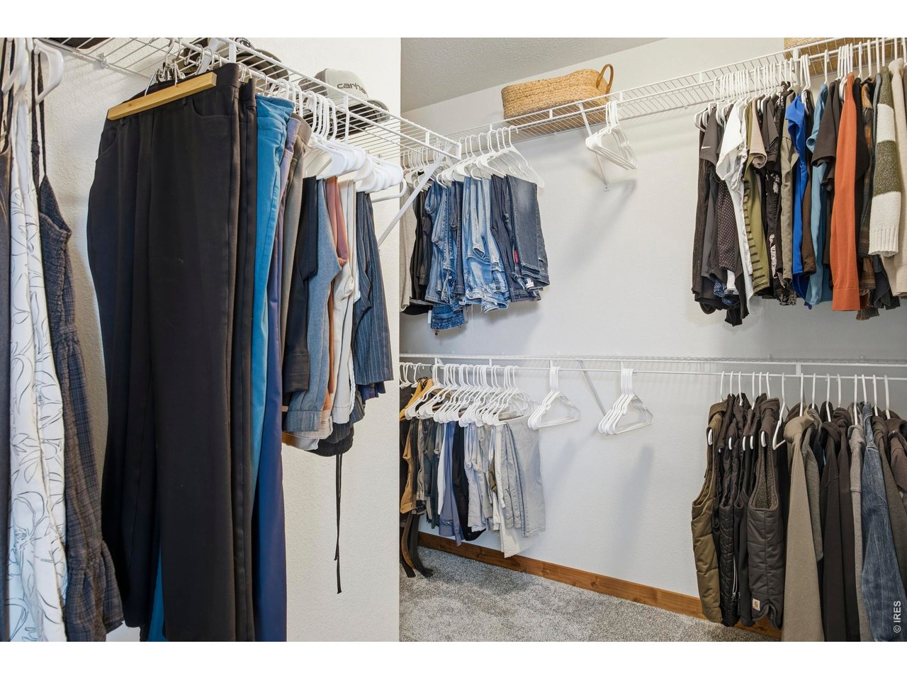414 Prairie Clover Way Severance, CO 80550 - Photo 30 of 49 a view of walk in closet with clothes and shoes