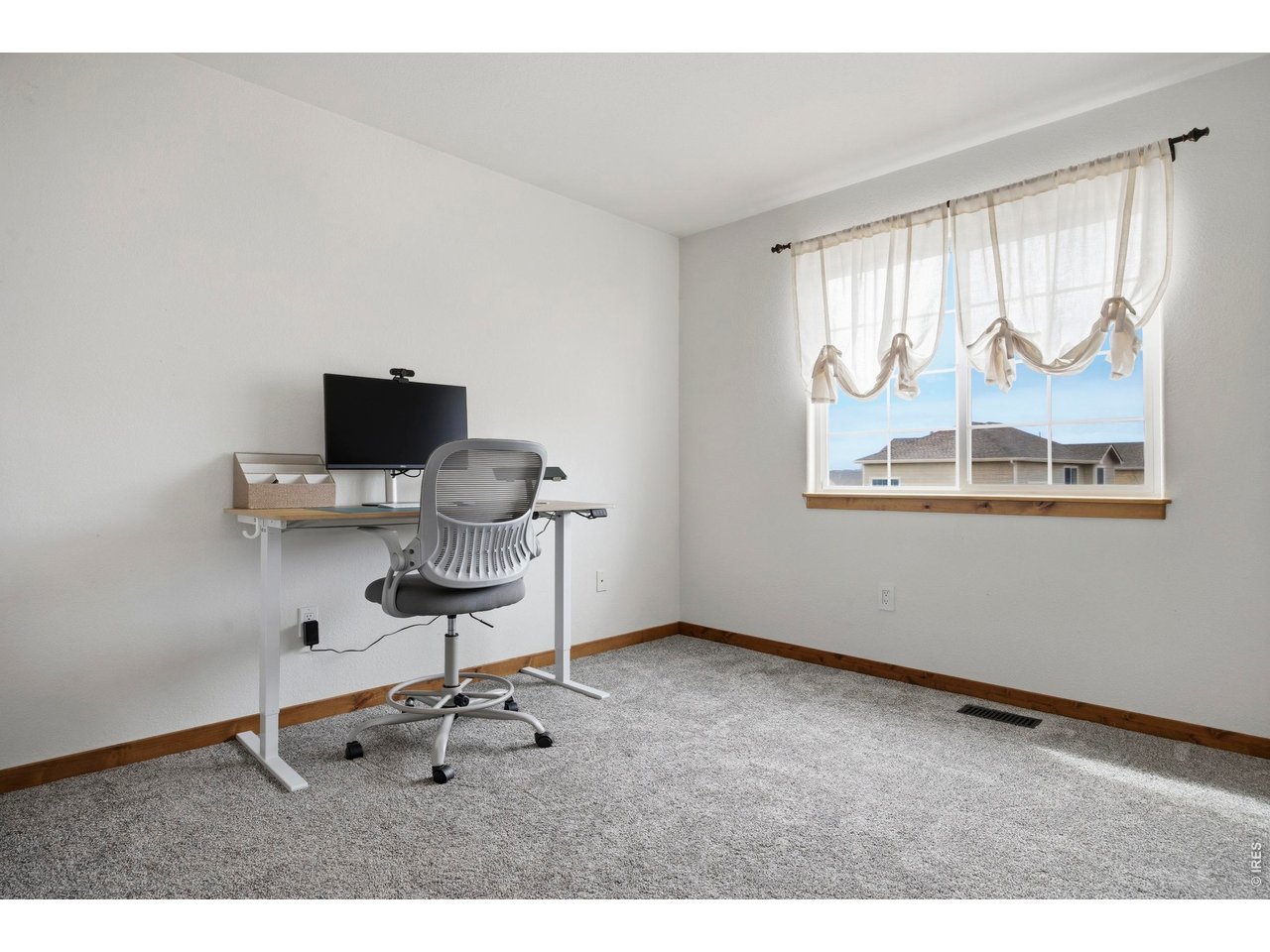 414 Prairie Clover Way Severance, CO 80550 - Photo 32 of 49 a workspace with furniture and a window